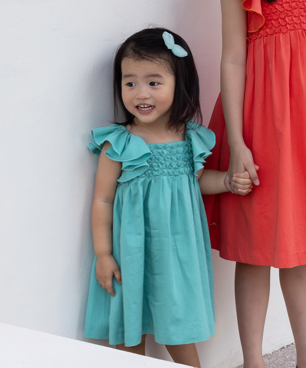 Hand smocked sateen dress